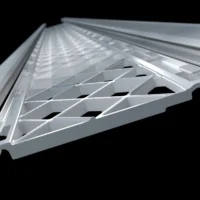 Close-up of a gutter guard frame being fastened to the front lip of the gutter on an Upstate South Carolina home